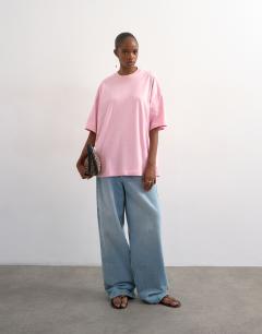 Model wearing Oversized drop shoulder tee in pink
