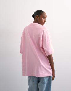 Model wearing Oversized drop shoulder tee in pink