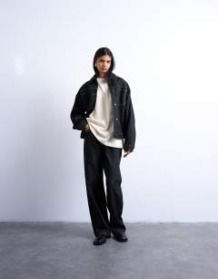 Model wearing Oversized drop shoulder tee in sand