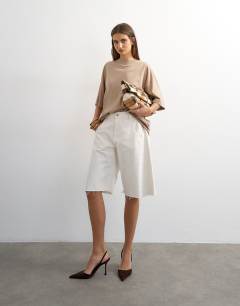 Model wearing Oversized drop shoulder tee in taupe