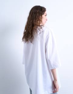 Model wearing Oversized drop shoulder tee in white
