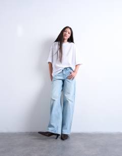 Model wearing Oversized drop shoulder tee in white