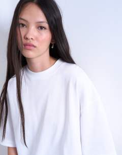 Model wearing Oversized drop shoulder tee in white