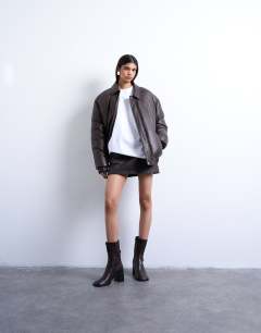 Model wearing Oversized drop shoulder tee in white