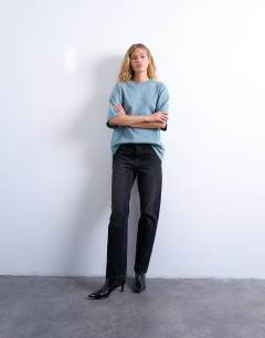 Model wearing Oversized drop shoulder tee lead blue