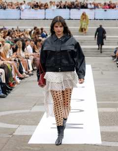 Model wearing Oversized faux leather bubble boxy zip through bomber jacket in black