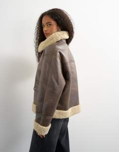 Model wearing Oversized faux shearling aviator in brown