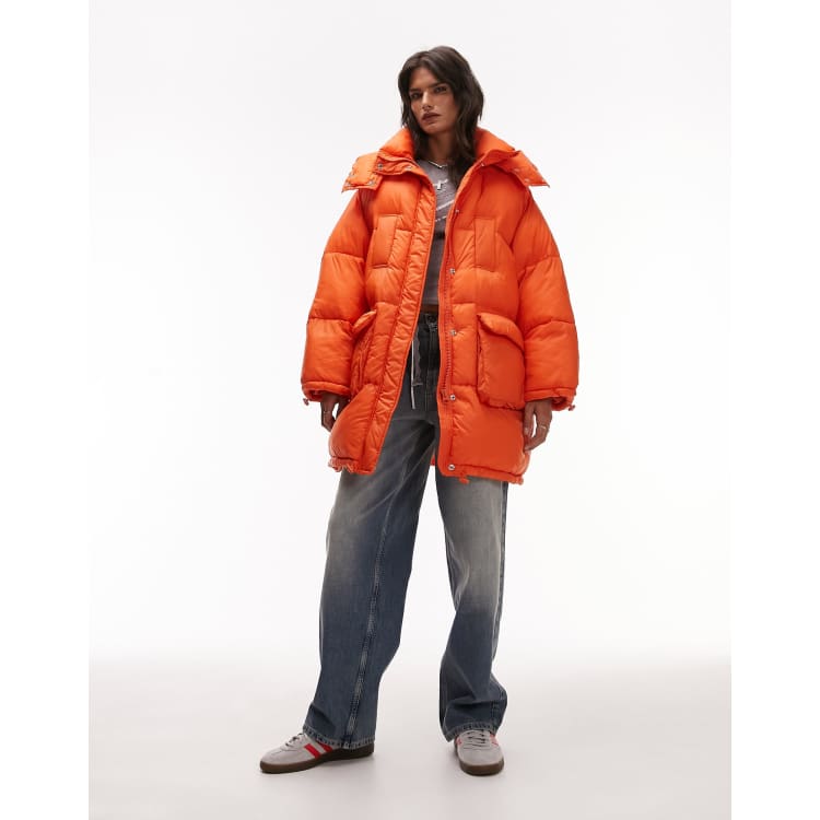 Bright orange jacket shop