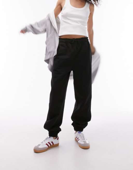 Topshop - Oversized joggingbukser med tætsiddende buksekanter i sort