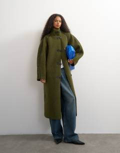 Oversized longline borg coat in green