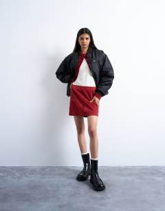 Model wearing Oversized nylon bomber jacket in black