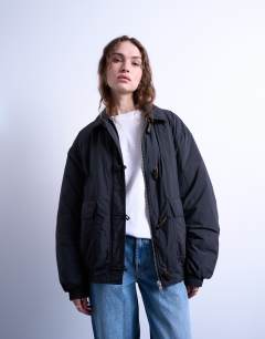 Oversized padded hybrid toggle bomber in black