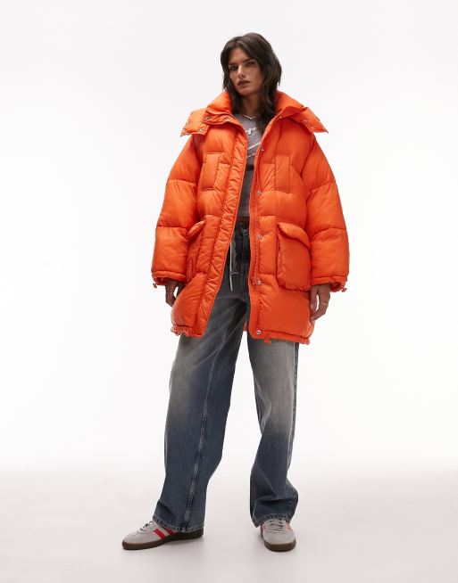 Topshop – Oversized-Pufferjacke in kräftigem Orange mit Kapuze und Vordertaschen