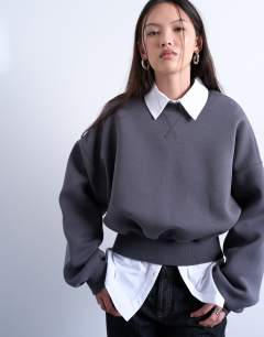 Model wearing Oversized scuba-style fabric cinch waist sweat in grey