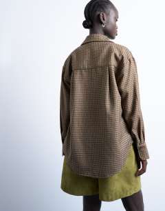 Model wearing Oversized shirt in heritage check