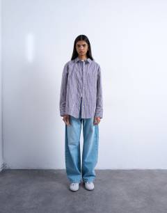 Model wearing Oversized shirt in purple stripe
