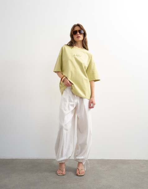 Topshop - Oversized T-shirt met grafische print en Amalfi-borduursel in limoengroen - view 1