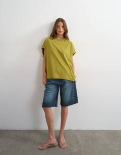Model wearing Oversized tank circle tee in olive