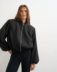 Model wearing Oversized zip up bomber jacket in black