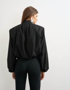 Model wearing Oversized zip up bomber jacket in black