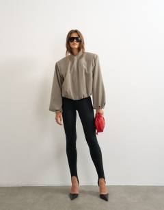 Model wearing Oversized zip up bomber jacket in stone