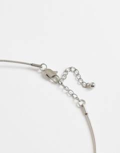 Model wearing Ozzie waterproof stainless steel necklace in silver brushed