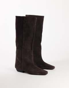 Model wearing Pablo real leather slim western boot in chocolate