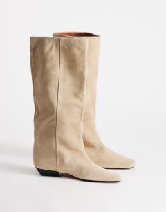 Model wearing Pablo real suede slim western boot in taupe