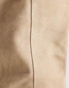 Model wearing Pablo real suede slim western boot in taupe