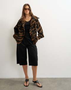 Model wearing Padded denim bomber jacket in zebra 