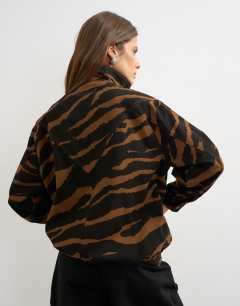 Model wearing Padded denim bomber jacket in zebra 