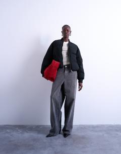 Model wearing Padded hybrid bomber jacket in black