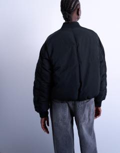 Model wearing Padded hybrid bomber jacket in black