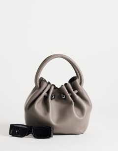 Model wearing Paige ring handle grab bag in grey