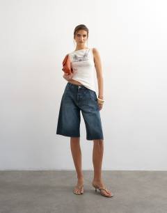 Model wearing Topshop 'Palm Tree' graphic vest in ecru