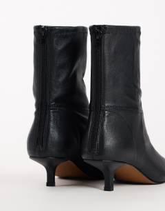 Model wearing Palmer real leather kitten heel ankle boot in black