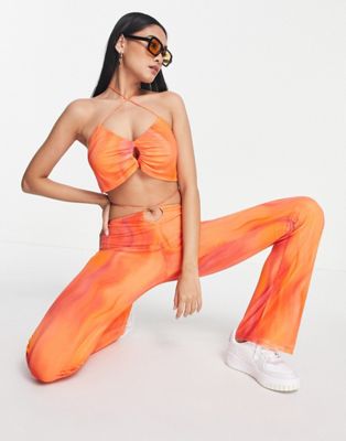Topshop - Pantalon d'ensemble évasé et brossé en tulle avec découpe goutte d'eau - Imprimé orange