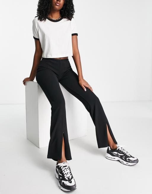 Topshop Pantalon vas fendu taille basse et fermeture clair