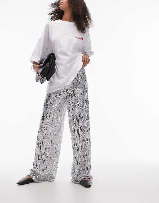 Topshop - Pantaloni a fondo ampio con paillettes color argento