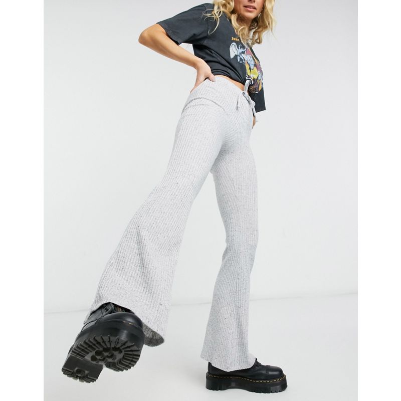 Pantaloni e leggings Pantaloni a zampa Topshop - Pantaloni a zampa a coste grigio mélange con allacciatura