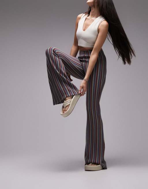 Topshop - Pantaloni a zampa in jersey a righe multicolore 