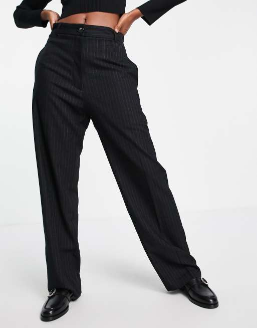 Topshop - Pantaloni neri gessati a vita molto bassa