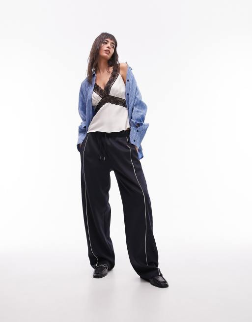 Topshop - Pantaloni sportivi blu navy con fondo ampio in coordinato
