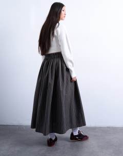 Model wearing Paper bag full circle maxi skirt in brown stripe