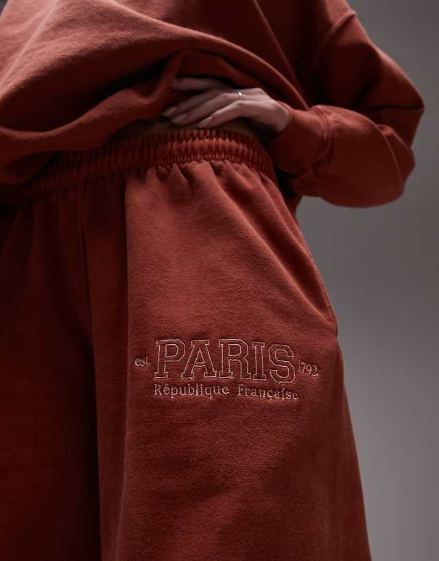 Topshop paris embroidered vintage wash oversized cuffed jogger in orange - part of a set 1