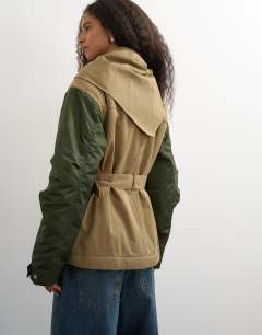 Model wearing Patch hybrid utility jacket in khaki
