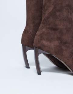Model wearing Pearl point toe faux suede ankle boot in chocolate