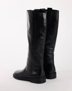 Model wearing Penelope real leather riding boot in black