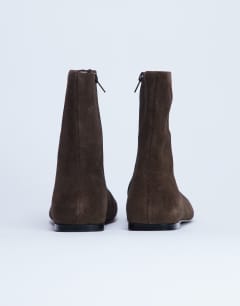 Model wearing Peri real suede flat square toe boot in chocolate