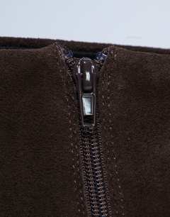 Model wearing Peri real suede flat square toe boot in chocolate